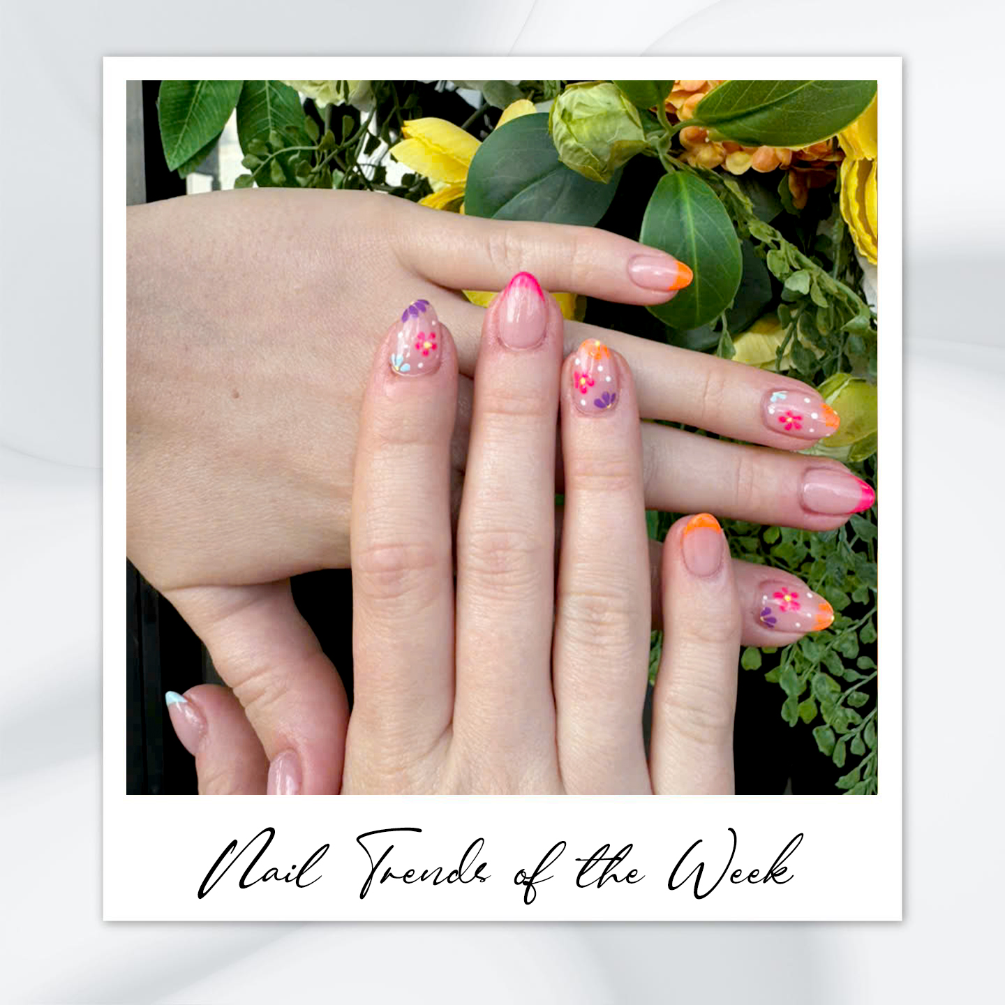 9 Almond Nail Designs You’ll Want to Try This Summer 7 Almond-shaped floral French nails with multicolor tips in pink, orange, and purple – featuring almond nail art designs, almond shaped nails, and summer almond nail ideas.