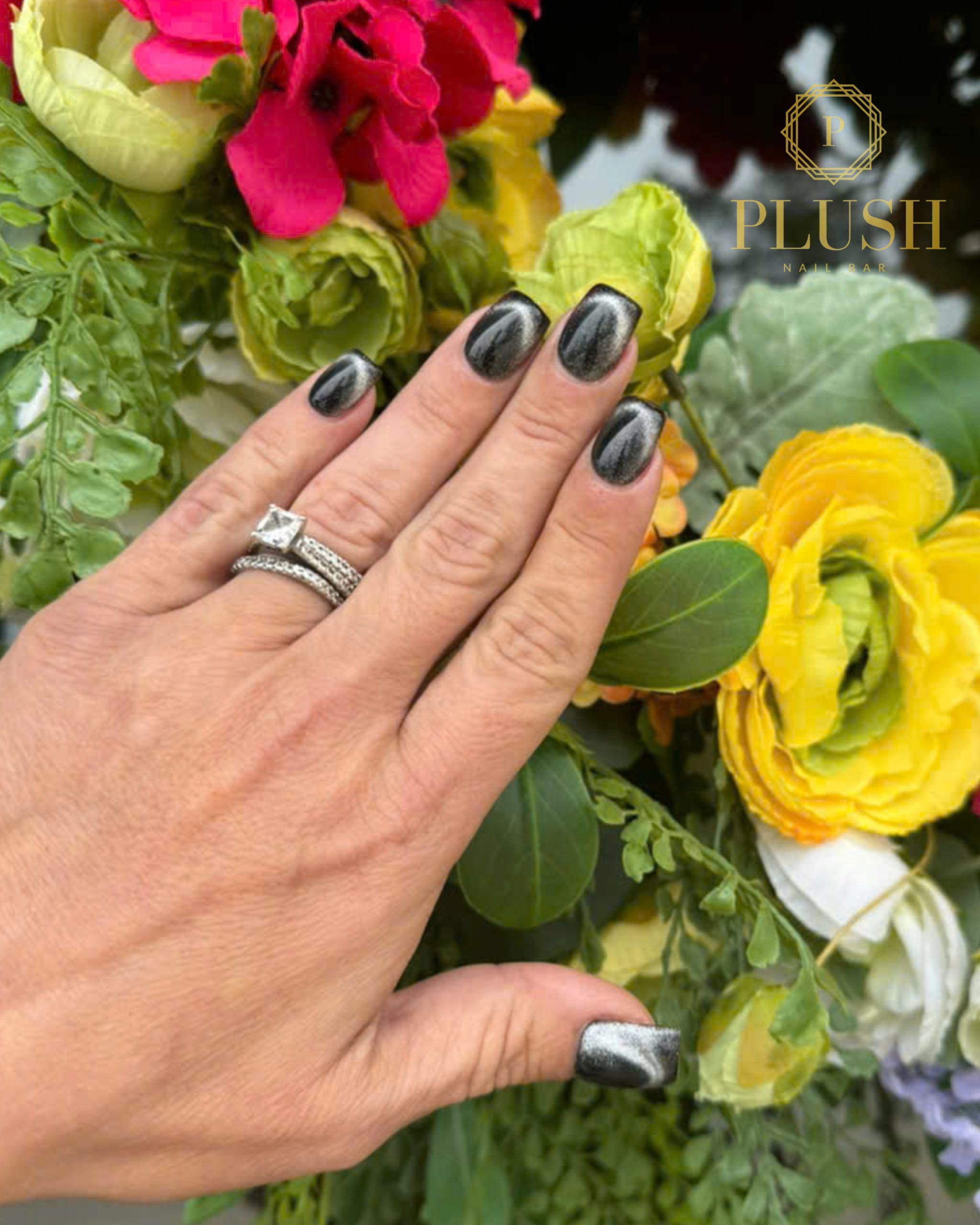 Top 5 Summer Nail Designs You Need to Try in 2025 2 Short square black chrome nails with magnetic shine – trendy short gel nails at Plush Nail Bar for summer 2025 with vegan gel manicure option.