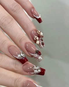 Dazzling 3D Nail Art Designs to Shine Bright This New Year! 1 Elegant Red & White Holiday Charm