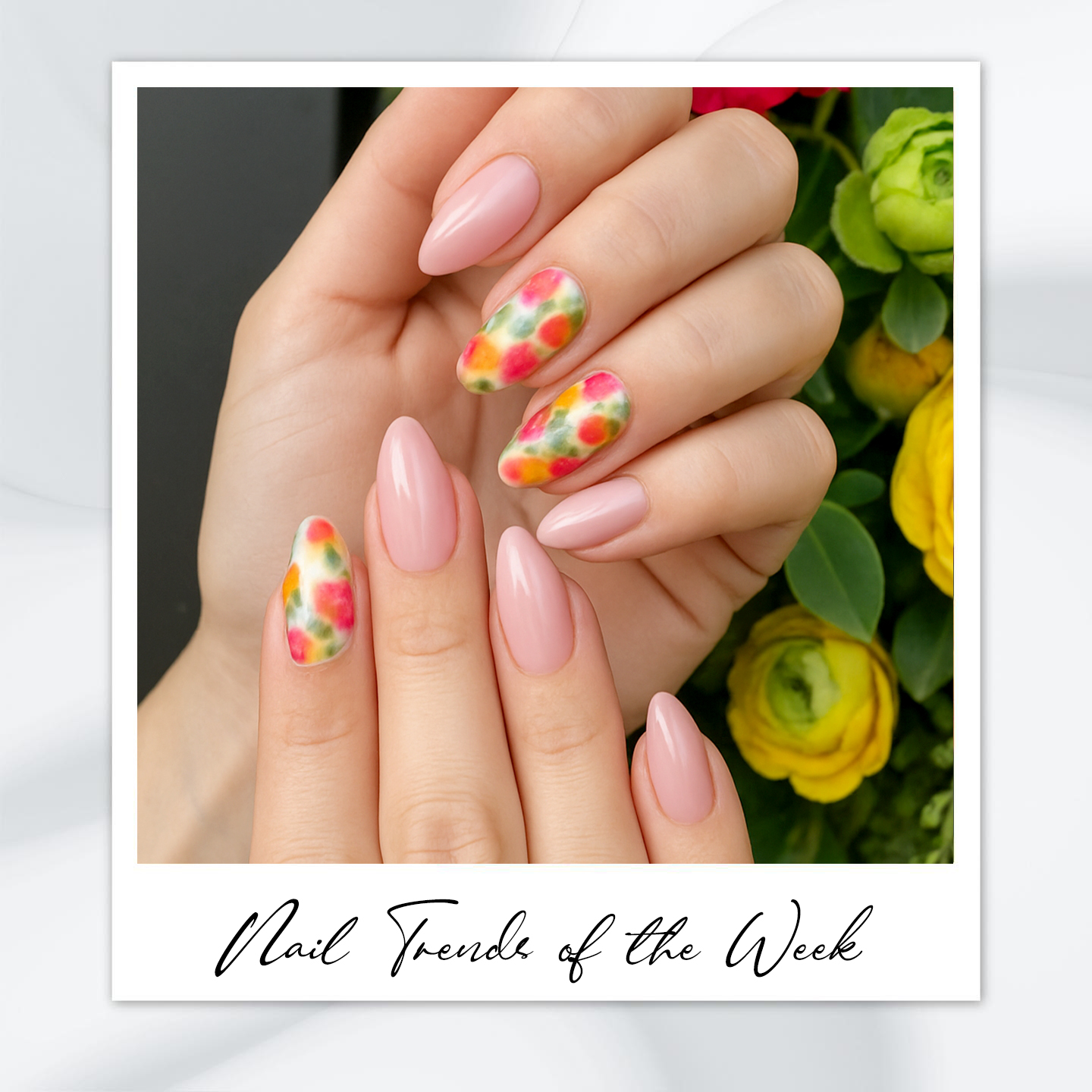 9 Almond Nail Designs You’ll Want to Try This Summer 5 Ombre almond nails with a watercolor floral effect in pink, green, and yellow – featuring almond nail art, almond-shaped nails, and colorful almond nail ideas for summer.