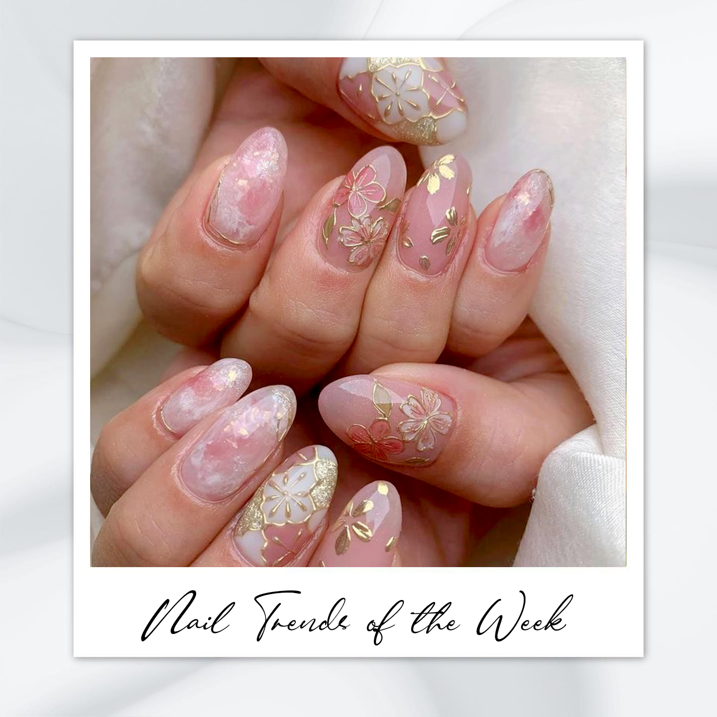 9 Almond Nail Designs You’ll Want to Try This Summer 2 Romantic pink almond nails with gold floral accents – featuring almond-shaped nails, almond nail art designs, classy almond nails, and trendy almond nail ideas for summer 2025.