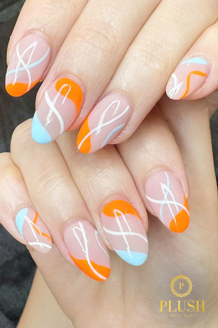 Almond-shaped nails with abstract orange, blue, and white swirl designs on a nude base, creating a playful and modern nail art look.